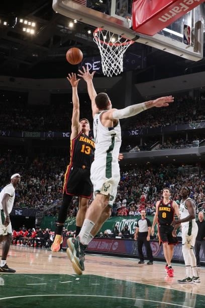Bogdan Bogdanovic of the Atlanta Hawks drives to the basket against the Milwaukee Bucks during Game 5 of the Eastern Conference Finals of the 2021...
