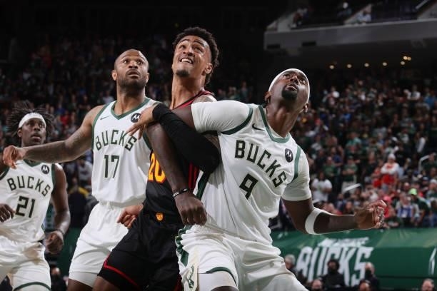Bobby Portis of the Milwaukee Bucks and John Collins of the Atlanta Hawks fight for position during Game 5 of the Eastern Conference Finals of the...