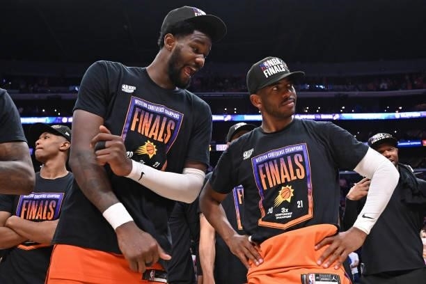 Deandre Ayton of the Phoenix Suns talks to Chris Paul of the Phoenix Suns after the game against the LA Clippers during Game 6 of the Western...