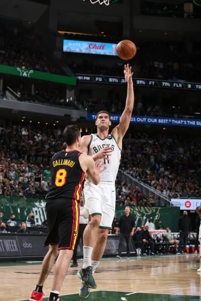 Brook Lopez of the Milwaukee Bucks shoots the ball against the Atlanta Hawks during Game 5 of the Eastern Conference Finals of the 2021 NBA Playoffs...