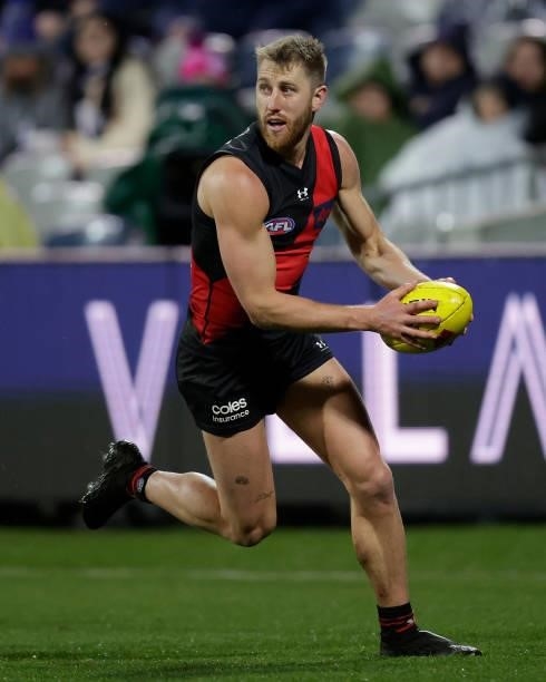 Dyson Heppell of the Bombers in action during the 2021 AFL Round 16 match between the Geelong Cats and the Essendon Bombers at GMHBA Stadium on July...