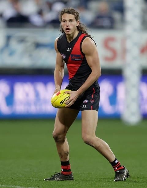Archie Perkins of the Bombers in action during the 2021 AFL Round 16 match between the Geelong Cats and the Essendon Bombers at GMHBA Stadium on July...