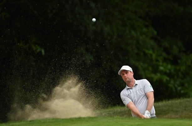 Kilkenny , Ireland - 2 July 2021; Jonathan Caldwell of Northern Ireland plays a shot from the bunker on the 12th hole during day two of the Dubai...