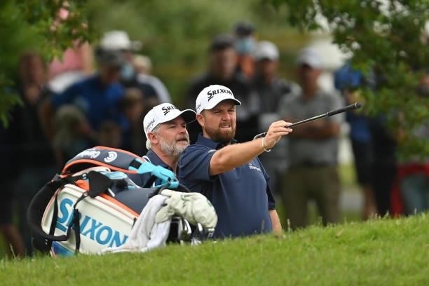 Kilkenny , Ireland - 2 July 2021; Shane Lowry of Ireland and his caddie Brian Martin during day two of the Dubai Duty Free Irish Open Golf...