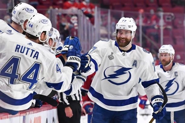 Victor Hedman of the Tampa Bay Lightning celebrates with the bench after scoring a goal against the Montreal Canadiens in Game Three of the Stanley...