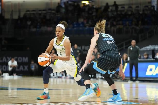 Moriah Jefferson of the Dallas Wings dribbles the ball against Courtney Vandersloot of the Chicago Sky on July 2, 2021 at the College Park Center in...