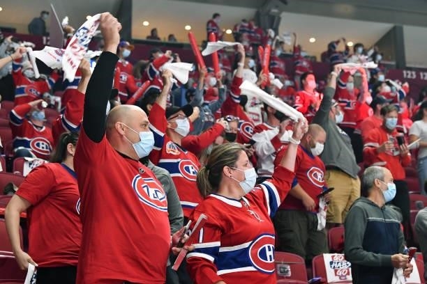 Fans cheer during warmups prior to the Game Three of the Stanley Cup Final of the 2021 Stanley Cup Playoffs between the Montreal Canadiens and the...