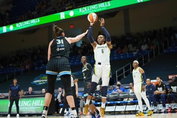 Kayla Thornton of the Dallas Wings shoots the ball over Stefanie Dolson of the Chicago Sky on July 2, 2021 at the College Park Center in Arlington,...