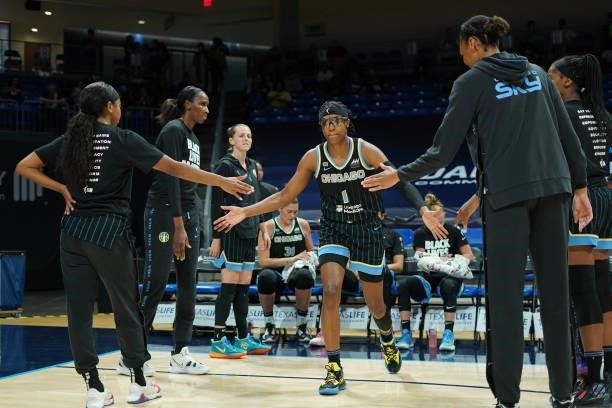Diamond DeShields of the Chicago Sky high fives her teammates before the game against the Dallas Wings on July 2, 2021 at the College Park Center in...