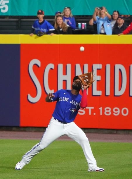 Teoscar Hernandez of the Toronto Blue Jays makes a catch on a pop fly by Randy Arozarena of the Tampa Bay Rays during the seventh inning at Sahlen...