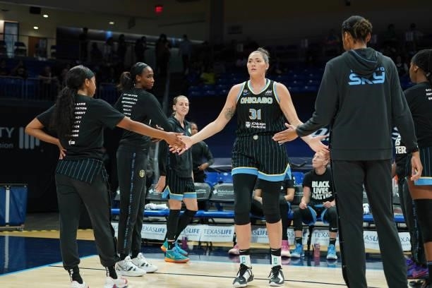Stefanie Dolson of the Chicago Sky high fives her teammates before the game against the Dallas Wings on July 2, 2021 at the College Park Center in...