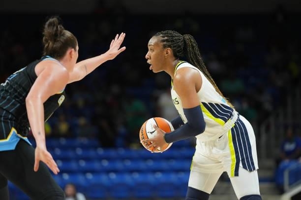 Kayla Thornton of the Dallas Wings handles the ball against Stefanie Dolson of the Chicago Sky on July 2, 2021 at the College Park Center in...