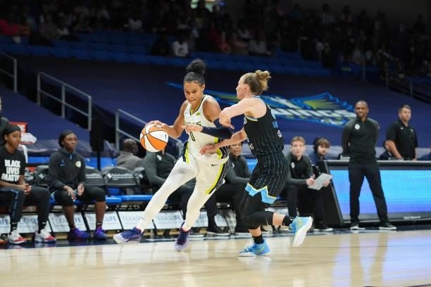 Courtney Vandersloot of the Chicago Sky plays defense on Satou Sabally of the Dallas Wings on July 2, 2021 at the College Park Center in Arlington,...
