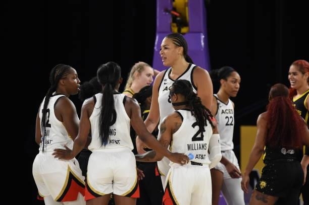Liz Cambage of the Las Vegas Aces talks with teammates during the game against the Los Angeles Sparks on July 2, 2021 at Los Angeles Convention...