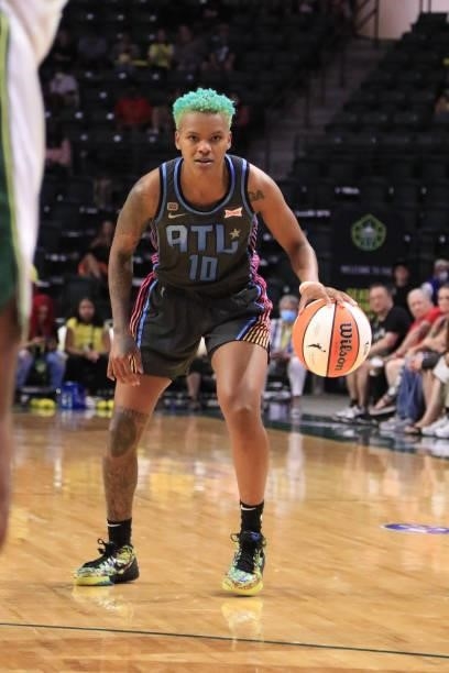 Courtney Williams of the Atlanta Dream handles the ball against the Seattle Storm on July 2, 2021 at the Angel of the Winds Arena, in Everett,...