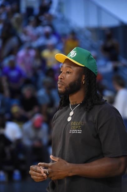 New Orleans Saints running back Alvin Kamara looks on during the Las Vegas Aces vs. Los Angeles Sparks game on July 2, 2021 at Los Angeles Convention...