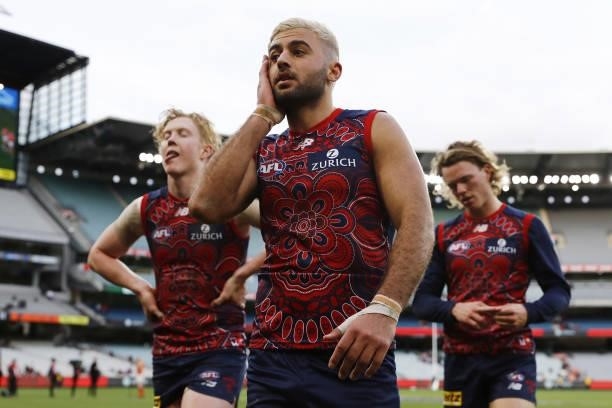Christian Salem of the Demons reacts after a loss during the 2021 AFL Round 16 match between the Melbourne Demons and the GWS Giants at the Melbourne...