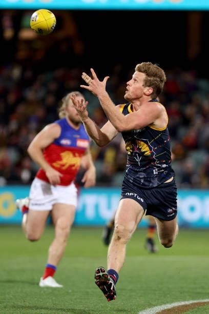 Rory Sloane of the Crows marks the ball during the 2021 AFL Round 16 match between the Adelaide Crows and the Brisbane Lions at Adelaide Oval on July...