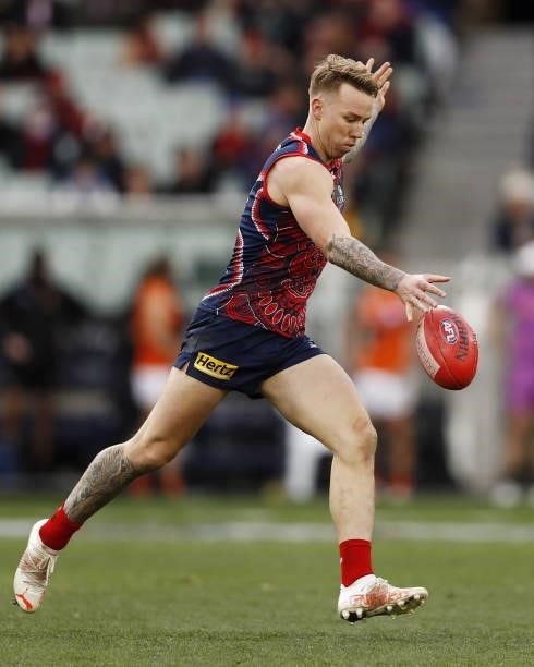 James Harmes of the Demons kicks the ball during the 2021 AFL Round 16 match between the Melbourne Demons and the GWS Giants at the Melbourne Cricket...