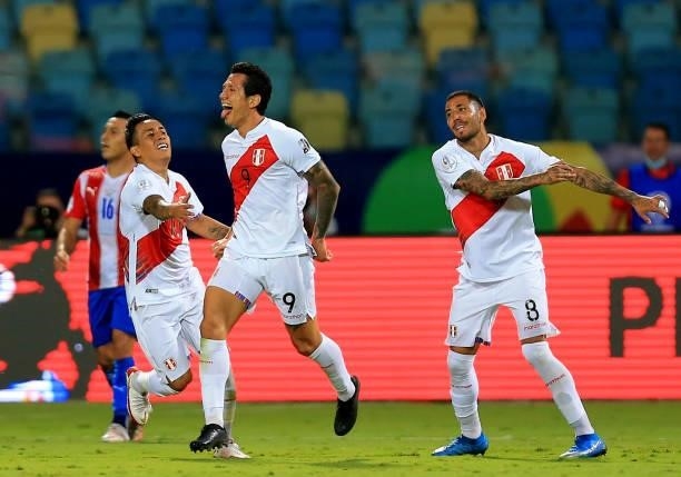 Gianluca Lapadula of Peru celebrates with his teammates after scoring a goal during the Quarterfinal match between Peru and Paraguay as part of...