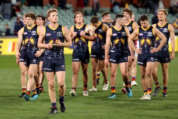 The Crows react after their loss during the 2021 AFL Round 16 match between the Adelaide Crows and the Brisbane Lions at Adelaide Oval on July 3,...