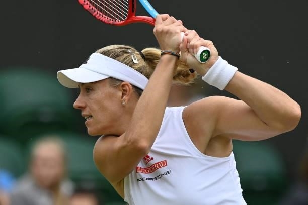 Germany's Angelique Kerber returns against Belarus' Aliaksandra Sasnovich during their women's singles third round match on the sixth day of the 2021...