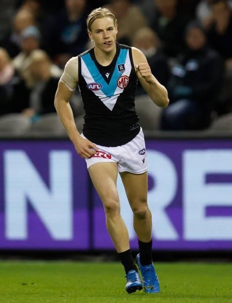 Miles Bergman of the Power celebrates a goal during the 2021 AFL Round 16 match between the Hawthorn Hawks and the Port Adelaide Power at Marvel...