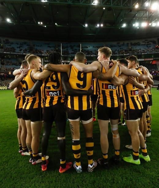 The Hawks huddle during the 2021 AFL Round 16 match between the Hawthorn Hawks and the Port Adelaide Power at Marvel Stadium on July 3, 2021 in...