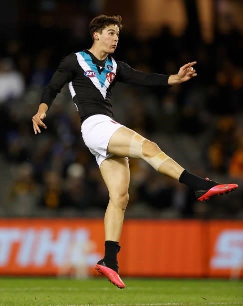 Connor Rozee of the Power kicks the ball during the 2021 AFL Round 16 match between the Hawthorn Hawks and the Port Adelaide Power at Marvel Stadium...