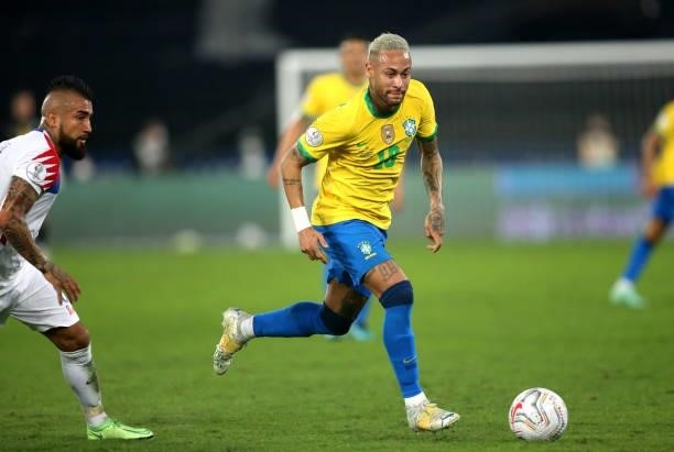 Neymar Jr of Brazil competes for the ball with Arturo Vidal of Chile ,during the Quarterfinal match between Brazil and Chile as part of Conmebol Copa...