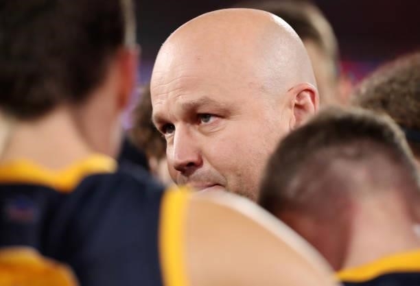 Matthew Nicks, Senior Coach of the Crows talks to his players at 3 quarter time during the 2021 AFL Round 16 match between the Adelaide Crows and the...