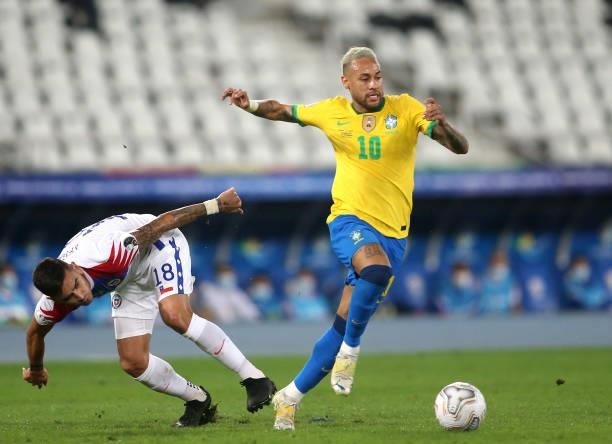 Neymar Jr of Brazil competes for the ball with Sebastian Vegas of Chile ,during the Quarterfinal match between Brazil and Chile as part of Conmebol...