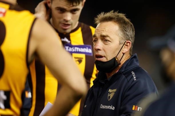 Alastair Clarkson, Senior Coach of the Hawks addresses his players during the 2021 AFL Round 16 match between the Hawthorn Hawks and the Port...