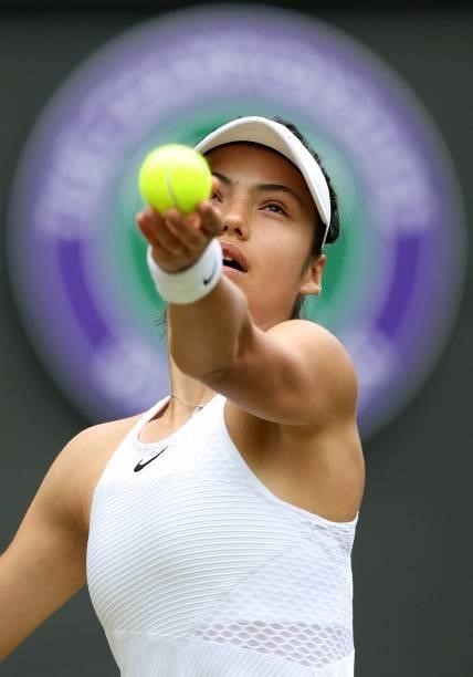 Britain's Emma Raducanu throws the ball to serve against Romania's Sorana Cirstea during their women's singles third round match on the sixth day of...