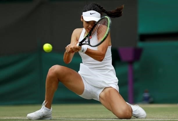 Britain's Emma Raducanu returns against Romania's Sorana Cirstea during their women's singles third round match on the sixth day of the 2021...