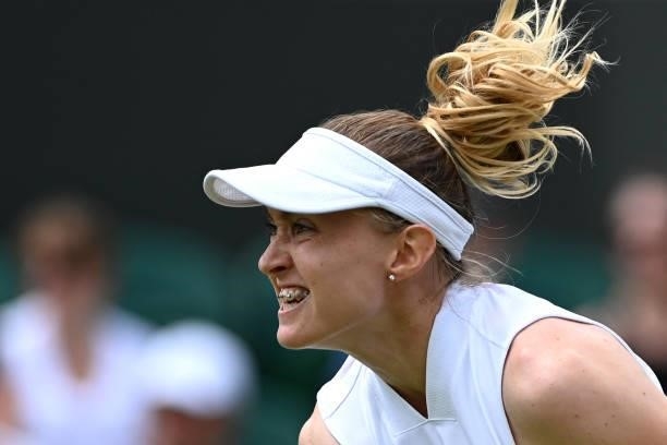 Belarus' Aliaksandra Sasnovich returns to Germany's Angelique Kerber during their women's singles third round match on the sixth day of the 2021...