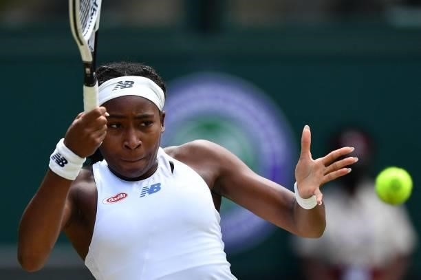 Player Coco Gauff returns against Slovenia's Kaja Juvan during their women's singles third round match on the sixth day of the 2021 Wimbledon...