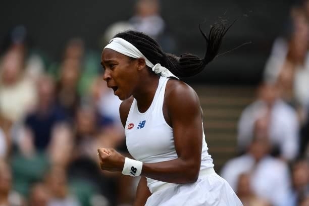 Player Coco Gauff celebrates a point against Slovenia's Kaja Juvan during their women's singles third round match on the sixth day of the 2021...