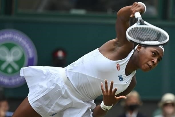Player Coco Gauff serves against Slovenia's Kaja Juvan during their women's singles third round match on the sixth day of the 2021 Wimbledon...