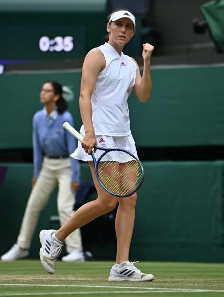 Slovenia's Kaja Juvan celebrates a point US player Coco Gauff during their women's singles third round match on the sixth day of the 2021 Wimbledon...