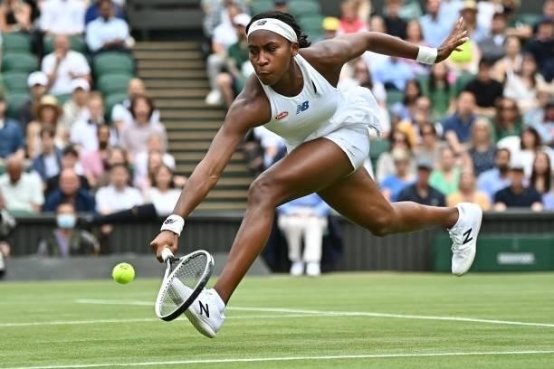 Player Coco Gauff runs for a return against Slovenia's Kaja Juvan during their women's singles third round match on the sixth day of the 2021...