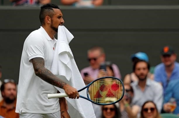 Australia's Nick Kyrgios reacts against Canada's Felix Auger-Aliassime during their men's singles third round match on the sixth day of the 2021...