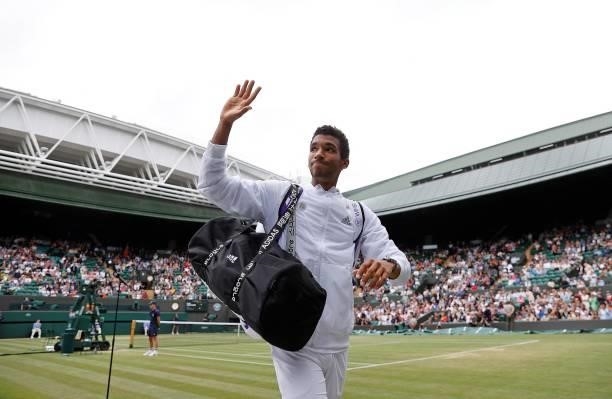 Canada's Felix Auger-Aliassime waves to the crowd after winning against Australia's Nick Kyrgios during their men's singles third round match on the...