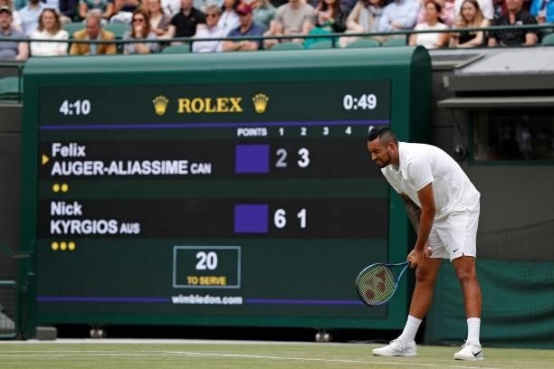 Australia's Nick Kyrgios reacts in pain as he plays against Canada's Felix Auger-Aliassime during their men's singles third round match on the sixth...