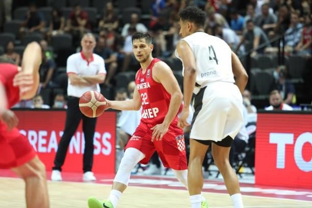 Roko Robic of Croatia passes the ball during the 2020 FIBA Men's Olympic Qualifying Tournament game between Germany and Croatia at Spaladium Arena on...