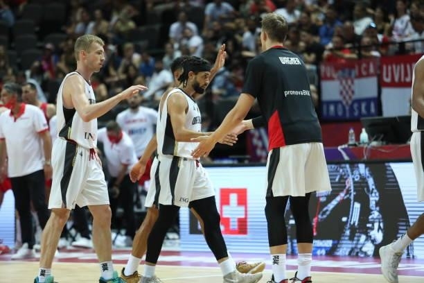 German players celebrate after the 2020 FIBA Men's Olympic Qualifying Tournament game between Germany and Croatia at Spaladium Arena on July 3, 2021...