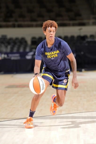 Danielle Robinson of the Indiana Fever warms up before the game against the Connecticut Sun on July 3, 2021 at Indiana Farmers Coliseum in...