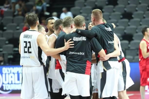 Germany players celebrate after the 2020 FIBA Men's Olympic Qualifying Tournament game between Germany and Croatia at Spaladium Arena on July 3, 2021...