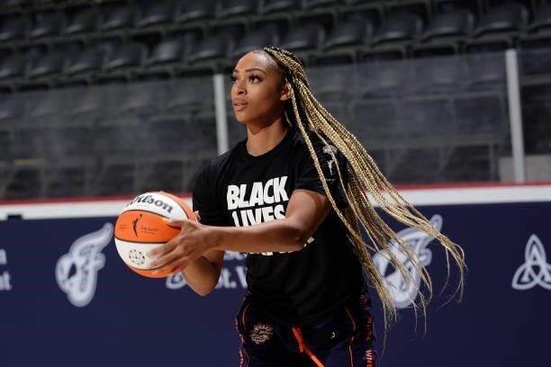 DiJonai Carrington of the Connecticut Sun warms up before the game against the Indiana Fever on July 3, 2021 at Indiana Farmers Coliseum in...