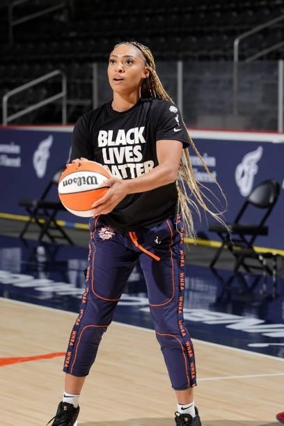 DiJonai Carrington of the Connecticut Sun warms up before the game against the Indiana Fever on July 3, 2021 at Indiana Farmers Coliseum in...